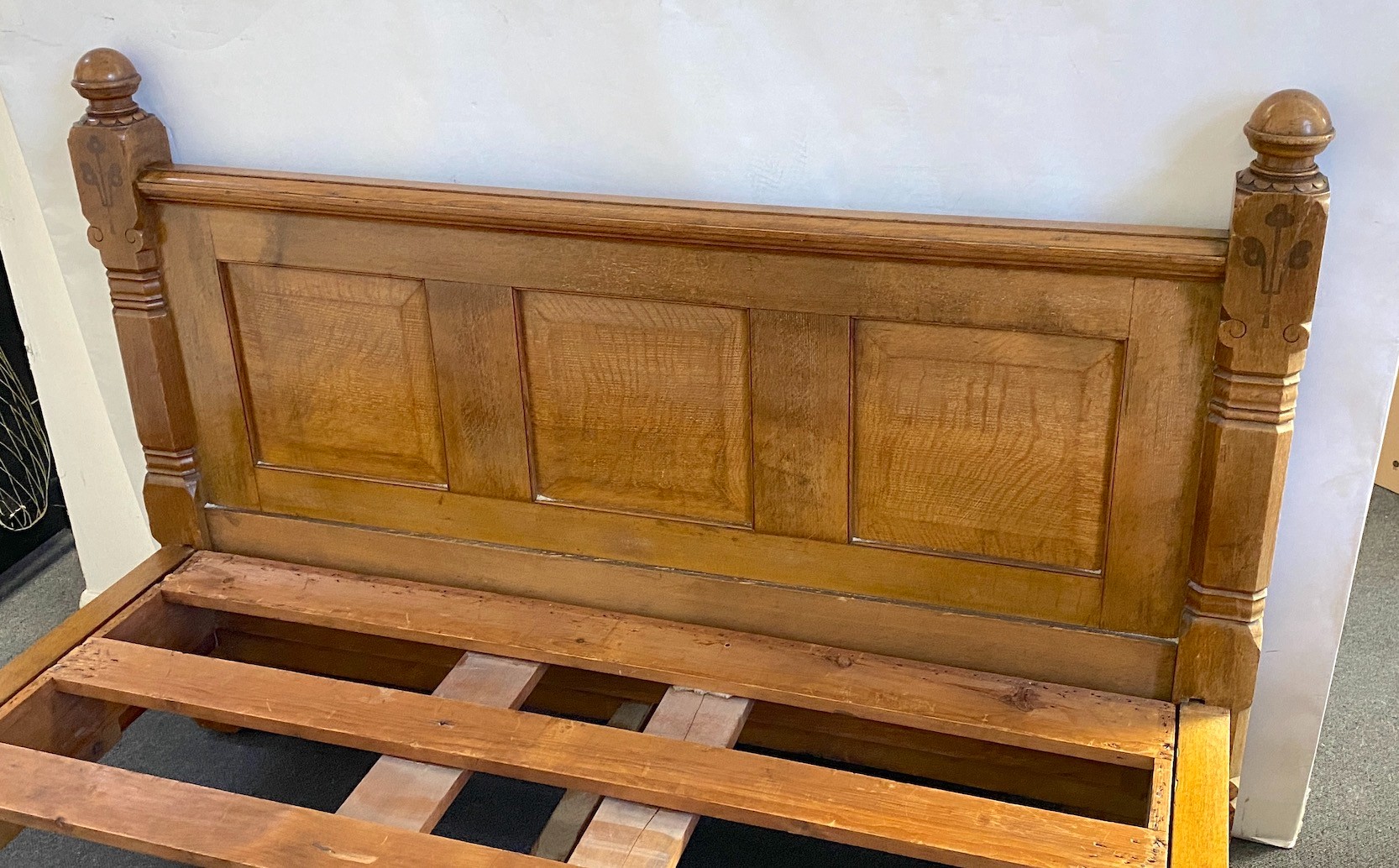 Charles Bevan probably for Marsh & Jones, Leeds. An Arts & Crafts pollard oak and marquetry half tester bed, width 156cm length 213cm height 226cm
